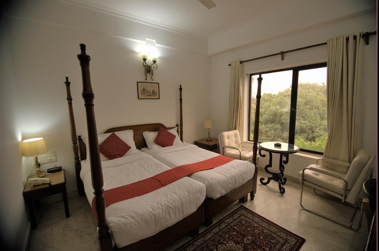 Hotel Palm Greens Nuova Delhi Esterno foto