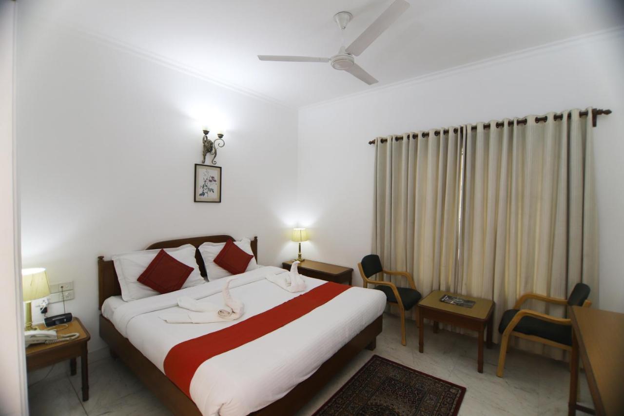 Hotel Palm Greens Nuova Delhi Esterno foto