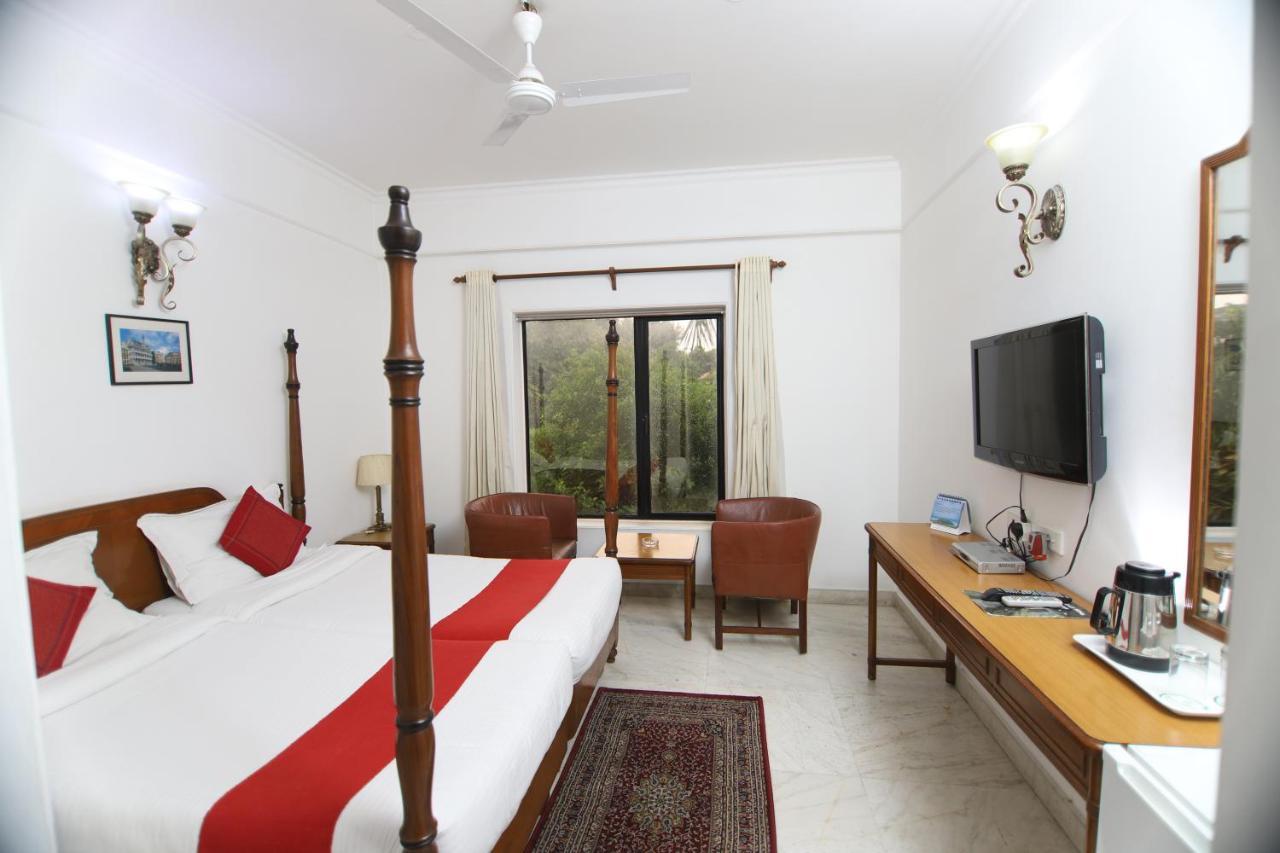 Hotel Palm Greens Nuova Delhi Esterno foto